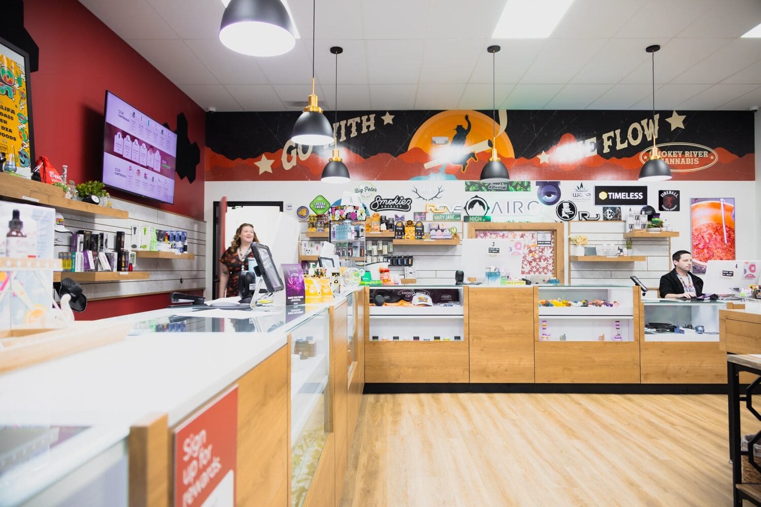 Swade-Kansas-City Cannabis shop interior with products and staff.